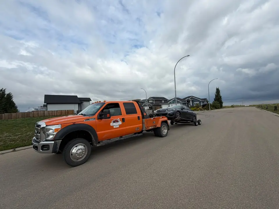 Force Towing truck transporting a customer vehicle