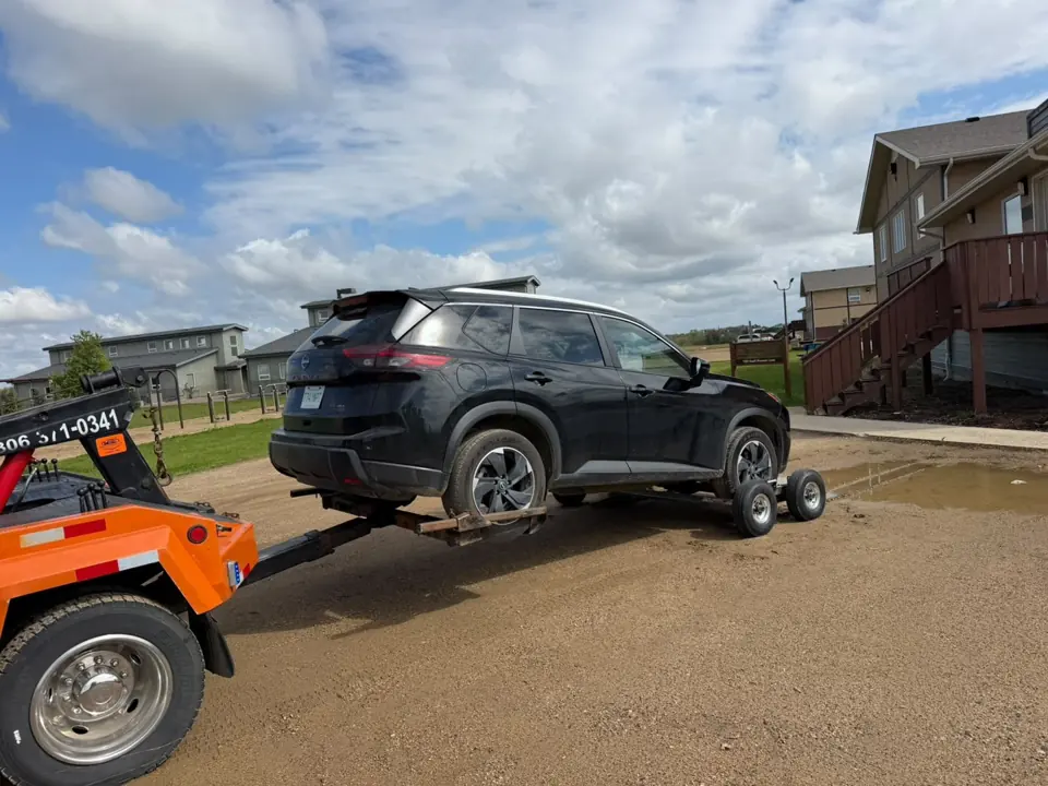 Force Towing truck transporting a customer vehicle