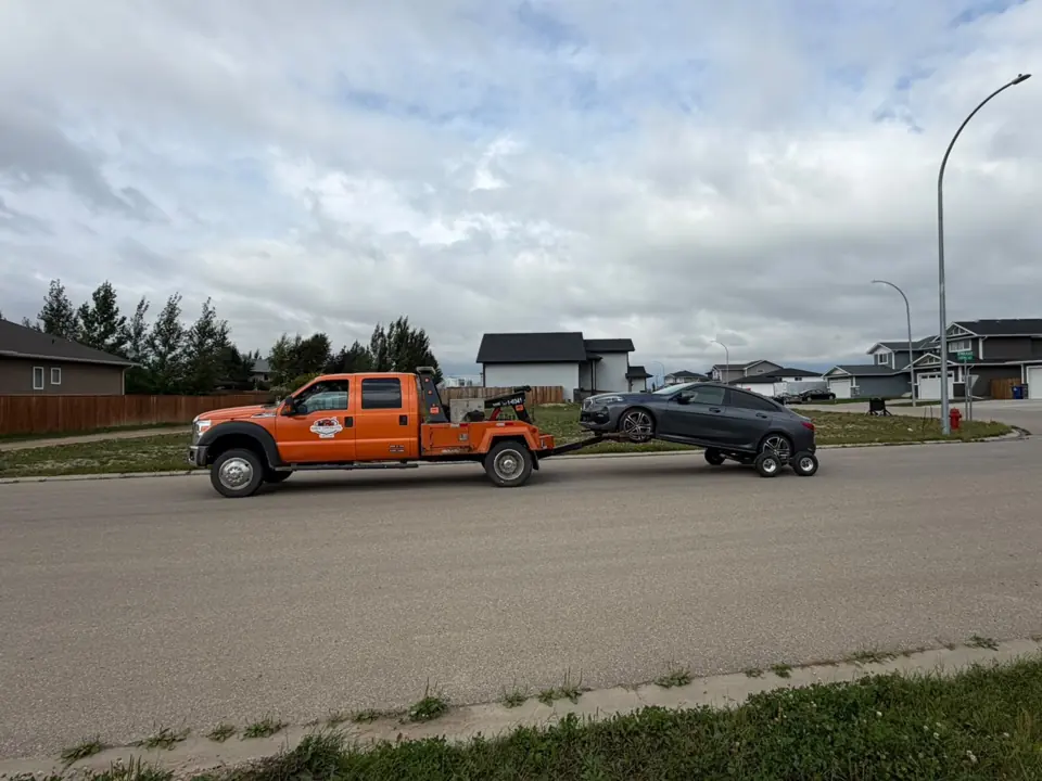 Force Towing truck transporting a customer vehicle