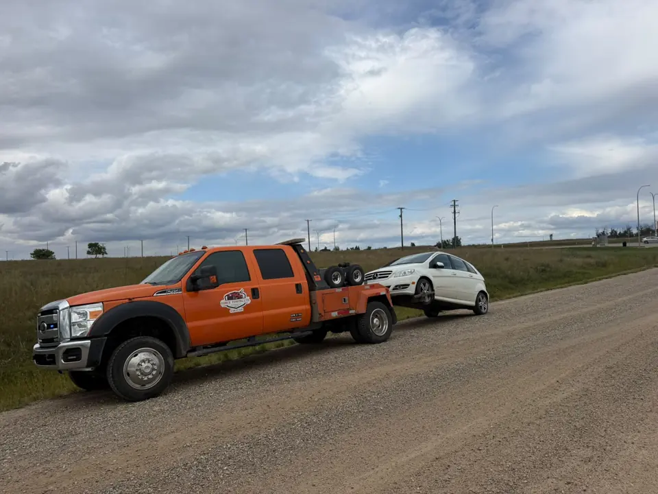 Force Towing truck transporting a customer vehicle
