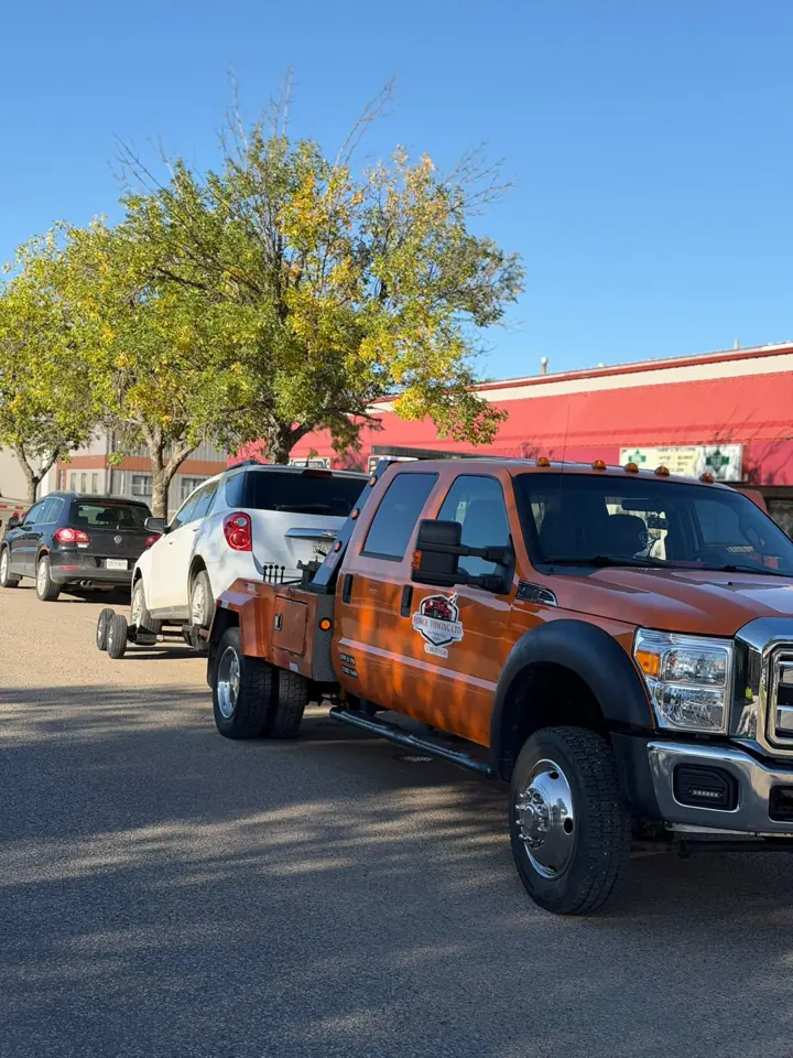 Force Towing truck transporting a customer vehicle