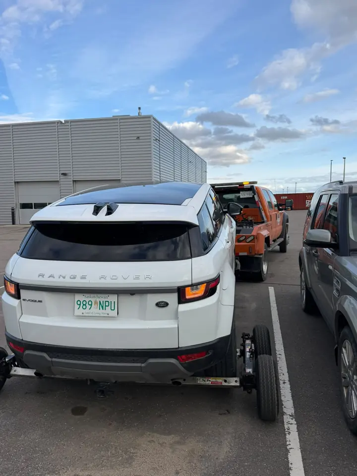Force Towing truck transporting a customer vehicle
