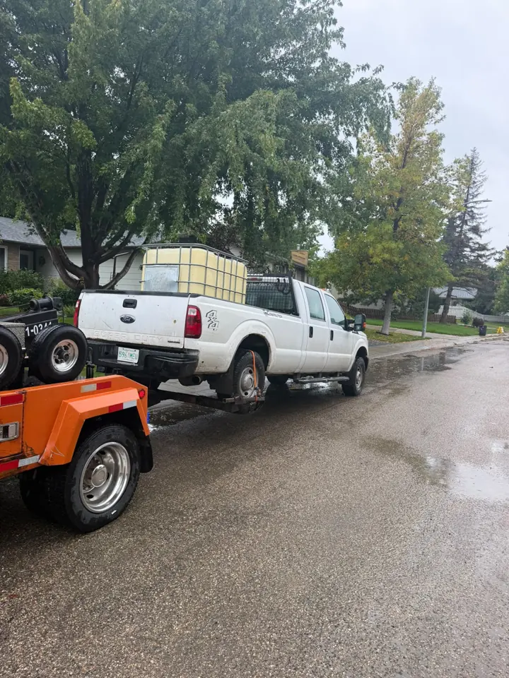 Force Towing truck transporting a customer vehicle