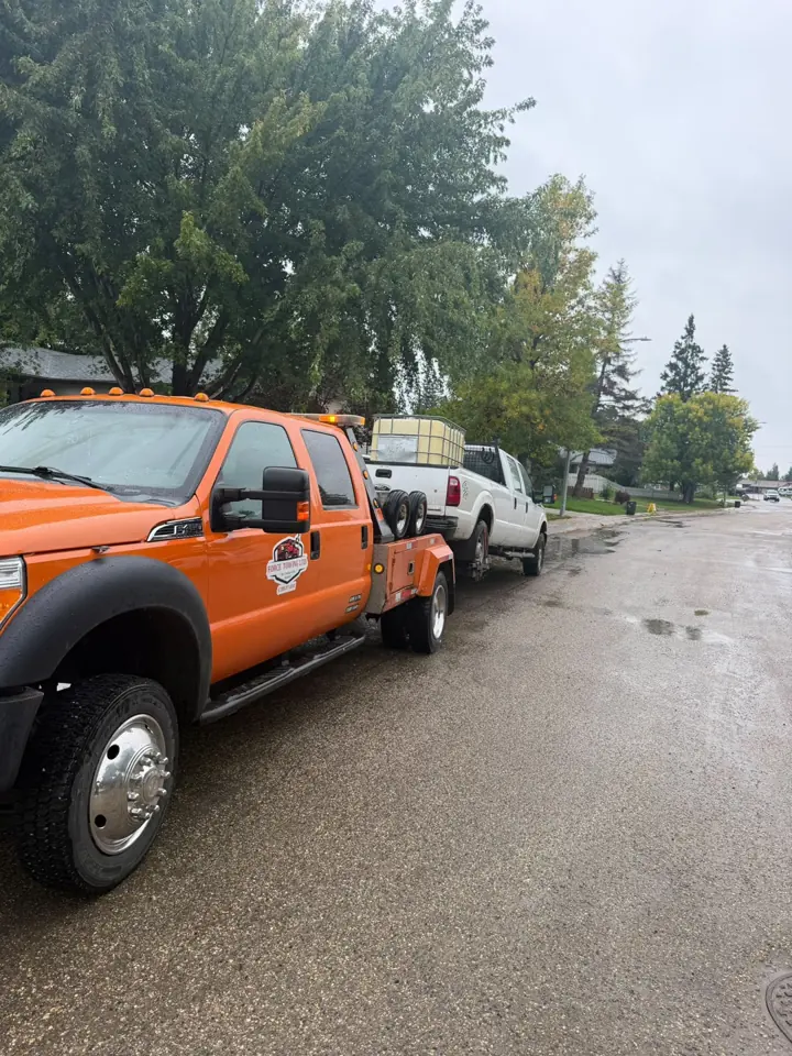 Force Towing truck transporting a customer vehicle