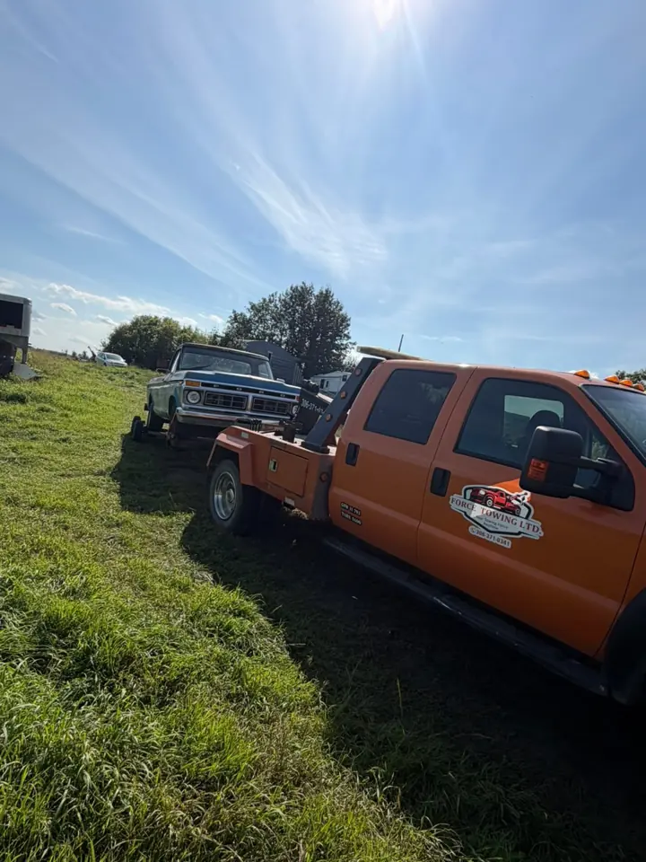 Force Towing truck transporting a customer vehicle
