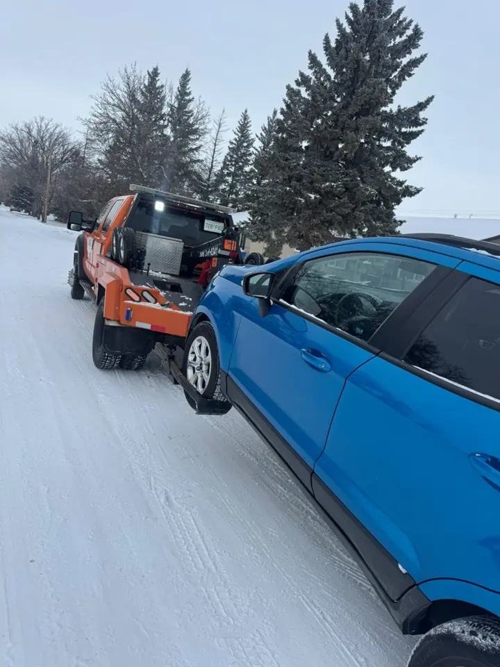 Force Towing truck transporting a customer vehicle