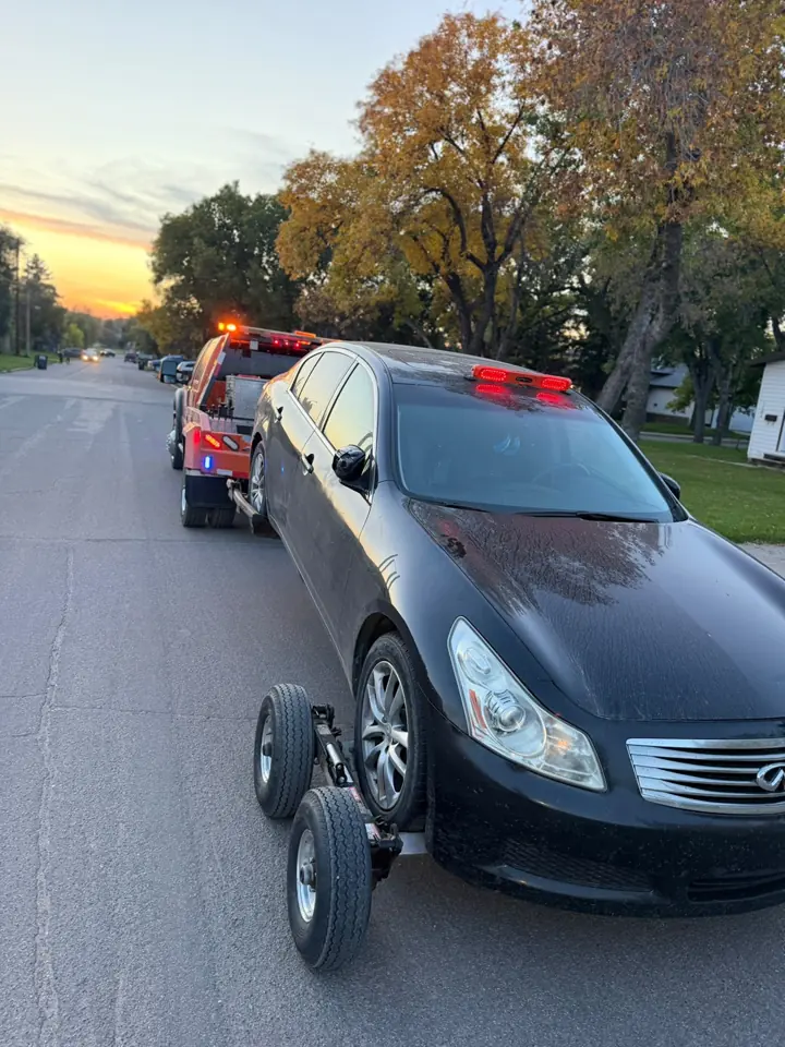 Force Towing truck transporting a customer vehicle