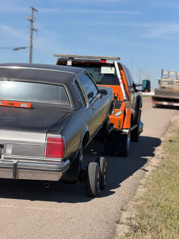 Force Towing truck transporting a customer vehicle
