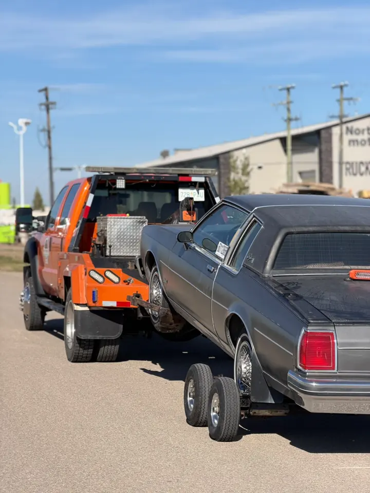 Force Towing truck transporting a customer vehicle