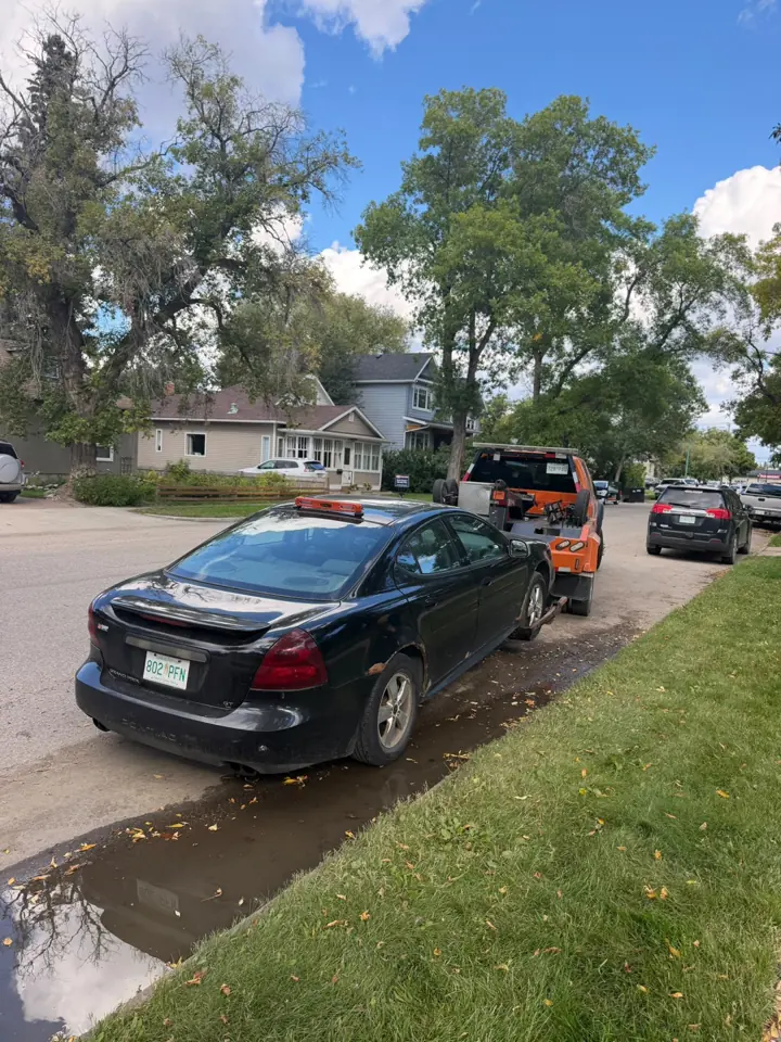 Force Towing truck transporting a customer vehicle