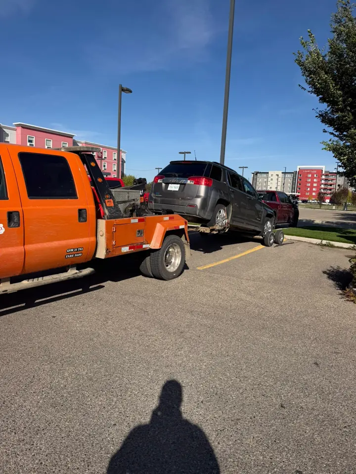 Force Towing truck transporting a customer vehicle