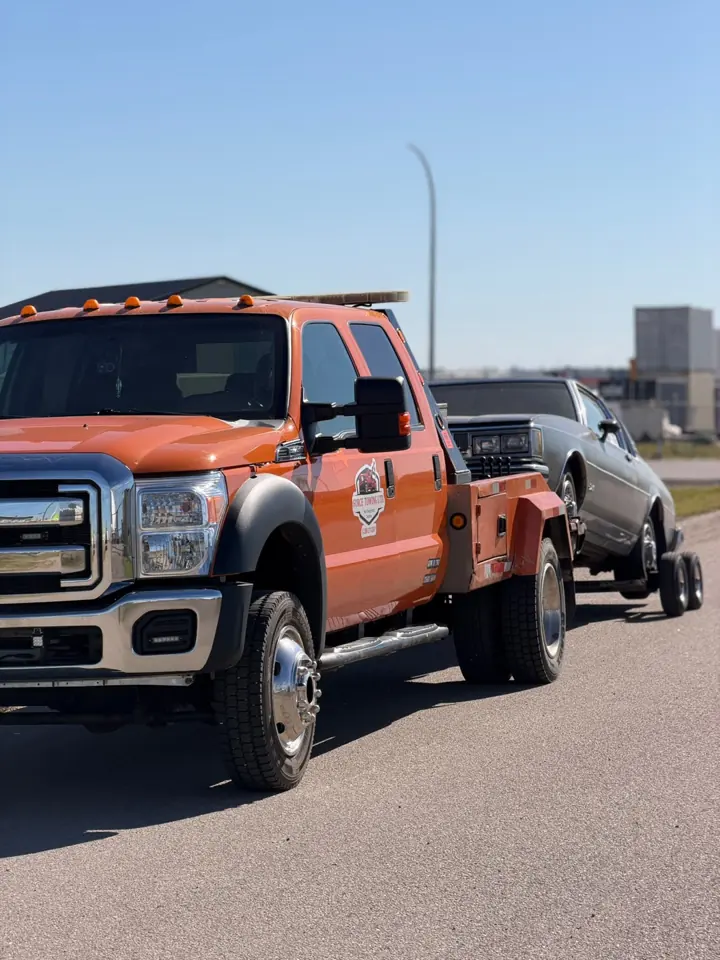 Force Towing truck transporting a customer vehicle